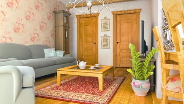 Czasem musimy umieścić w pokoju dziennym dużą szafę. Szukamy wtedy sposobów, by ją tak wkomponować we wnętrze, żeby nie rzucała się w oczy. Oto nasze pomysły. <BR > Za drzwiami Jeśli do stylu salonu nie pasuje żaden standardowy mebel, musimy zrobić szafę na miarę. Aby swobodnie mieściły się w niej wieszaki z ubraniami powinna mieć co najmniej 60 cm głębokości. Jeśli mamy więcej miejsca, warto zastanowić się nad garderobą. Fragment wnętrza przeznaczony na schowek oddzielamy ścianką np. z płyty gipsowo-kartonowej, z otworem, w który wmontujemy ościeżnicę i drzwi. W ten sposób stworzymy iluzję, że znajduje się tam przejście do innego pomieszczenia. Drzwi dobieramy tak, by pasowały zarówno do wnętrza, jak i do stylu innych skrzydeł w mieszkaniu. Nowo postawioną ściankę można pomalować na kolor pozostałych ścian lub okleić wzorzystą tapetą.