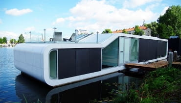 Pływająca willa De Omval architektów +31 architects w Amsterdamie Pływająca willa, domy na wodzie, dom na widzie w Amsterdamie