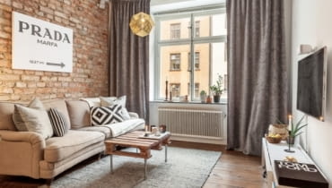 Ceglana ściana w skandynawskim mieszkaniu skandynawski styl, aranżacja wnętrz, wnętrza