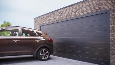 Bezpieczne, nowoczesne i trwałe bramy garażowe - co wybrać? Bezpieczne, nowoczesne i trwałe bramy garażowe - co wybrać?