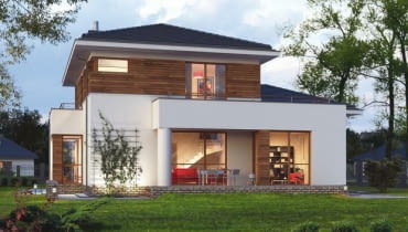 Elewacja od strony ogrodu, przez okna na parterze widać wnętrze salonu i gabinet. Na piętrze jest duży taras projekty domów