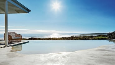 Infinity pool overlooking sea