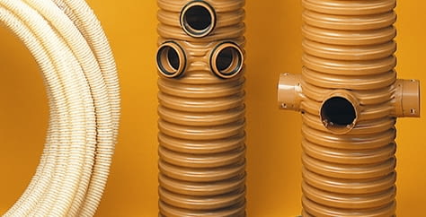 Podstawowe elementy drenażu opaskowego - rura drenarska i studzienki zbiorcze drenaż,drenaż opaskowy,fundamenty