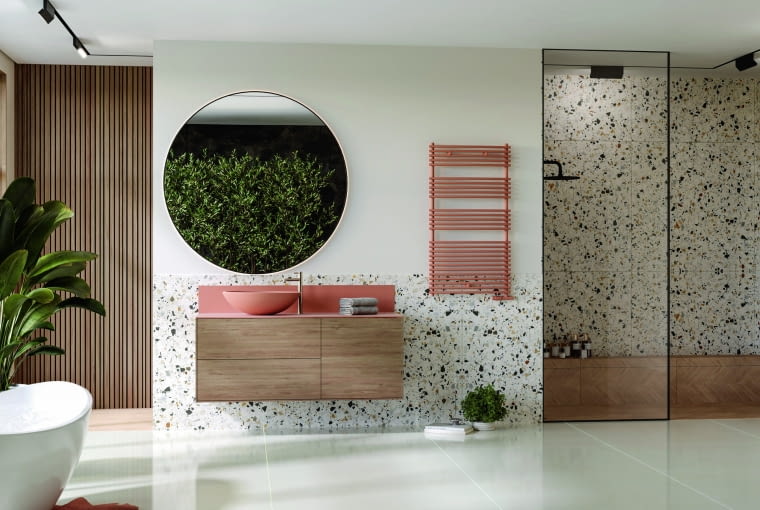 Ten model grzejnika ma zakrzywione, okrągłe rurki umieszczone na pionowych również zaokrąglonych kolektorach. Istnieje możliwość nie tylko doboru koloru, powłoki czy wykonania wymiarów niestandardowych, ale także zastosowania w urządzeniu grzałki elektrycznej