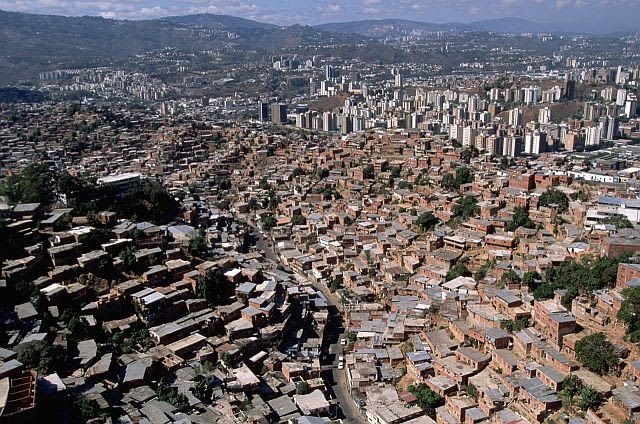 ca. 1970-1997, Federal District, Caracas, Venezuela --- Aerial View of Caracas Slums --- Image by Yann Arthus-Bertrand/CORBIS