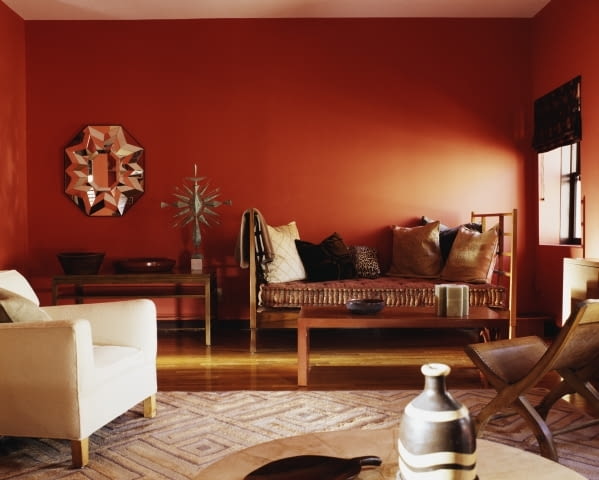 Wnętrza w czerwieni - salon ca. 1998 --- Red Living Room --- Image by Fernando Bengoechea/Beateworks/Corbis