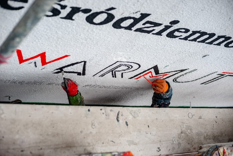 Warszawski mural wspierający gastronomię od Good Looking Studio.