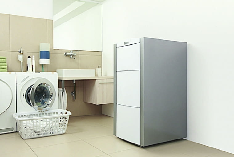 Kocioł kondensacyjny o większych rozmiarach nie musi stać w oddzielnym pomieszczeniu technicznym. Może on być 'sublokatorem' na przykład w prali lub warsztacie majsterkowicza Kocioł kondensacyjny o większych rozmiarach nie musi stać w oddzielnym pomieszczeniu technicznym. Może on być 'sublokatorem' na przykład w prali lub warsztacie majsterkowicza