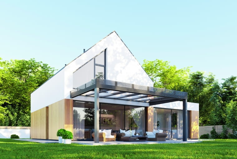 Imponujące rozmiary szyb w nowoczesnej stolarce sprawiają, że przestrzenie stają się bardziej otwarte, a granice między wnętrzem a otoczeniem domu niemal całkowicie zanikają