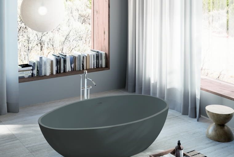 Tę asymetryczną wannę można dopasować do aranżacji za pomocą zewnętrznego lakieru w dowolnym kolorze z palety RAL. Szare wanny to obecnie synonim nowoczesnej elegancji