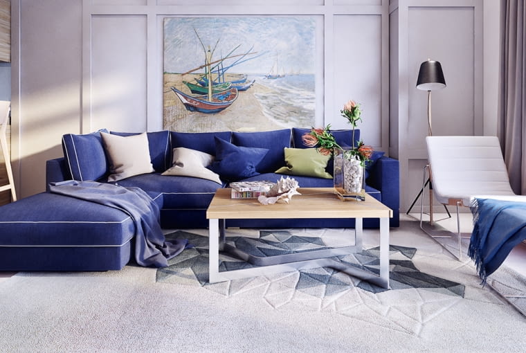 Sercem salonu jest duża, kobaltowa sofa. mieszkanie, mieszkanie nad morzem, styl marynistyczny