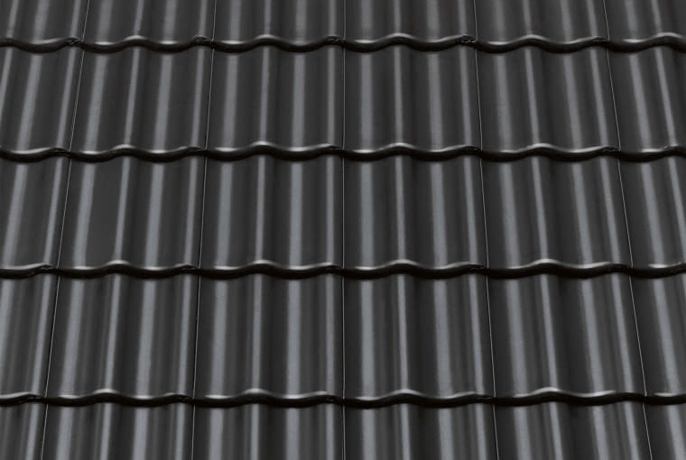 Celtycka CISAR/Monier BRAAS | Rodzaj: dachówka betonowa| wymiary [dł. x szer.]: 330 x 420 mm | masa [kg/m2]: od ok. 41,7 kg | zalecany kąt nachylenia połaci: minimum 22° | kolory: brązowy, ceglany, grafitowy. Cena: od 37,15 zł/m2, www.monier.pl