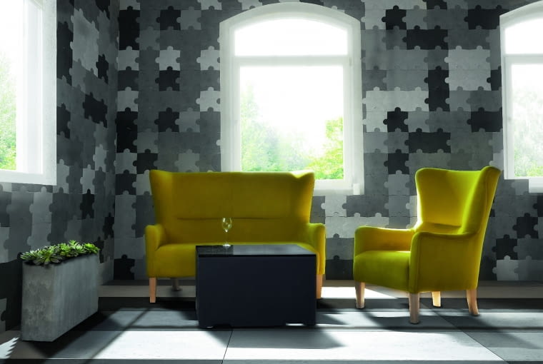 Projektanci lubią się bawić, zwłaszcza kiedy w grę wchodzi tak interesujący efekt. Betonowe płyty z serii Box 2 w kształcie puzzli tworzą na ścianie fantazyjną układankę. DecoConcrete/dekorian.pl