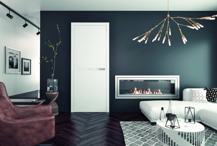 Delikatne frezy na wysokości klamki stanowią ciekawe przełamanie gładkiej powierzchni. Minimalistyczne, a jednocześnie intrygujące. Drzwi we wnętrzu