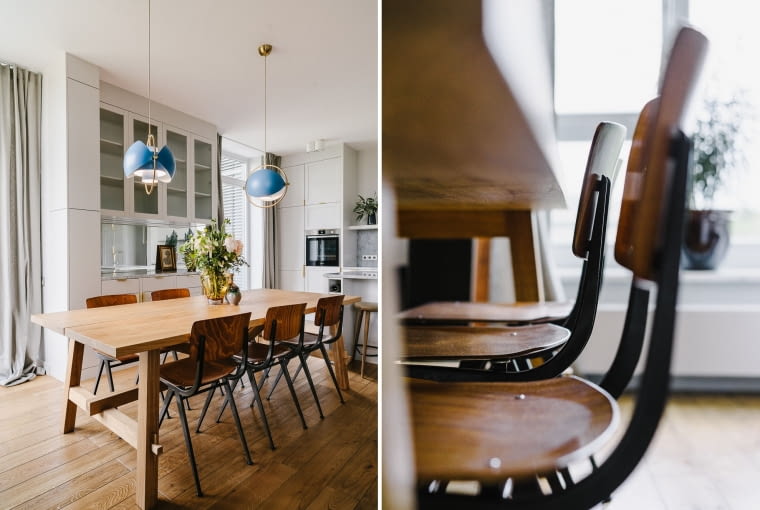 Jadalniany zakątek to fusion stylów. Prosty stół z surowego drewna, przy nim krzesła vintage Revolt (w tym samym miodowym odcieniu co regały), a nad - futurystyczne lampy Gubi Multi-Lite.
