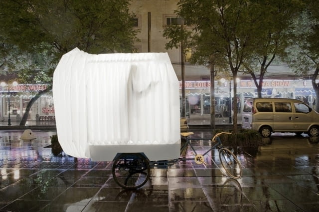 Dom składany jak harmonijka jest doczepiany do roweru Przenośne małe mieszkanie, projekt PAO