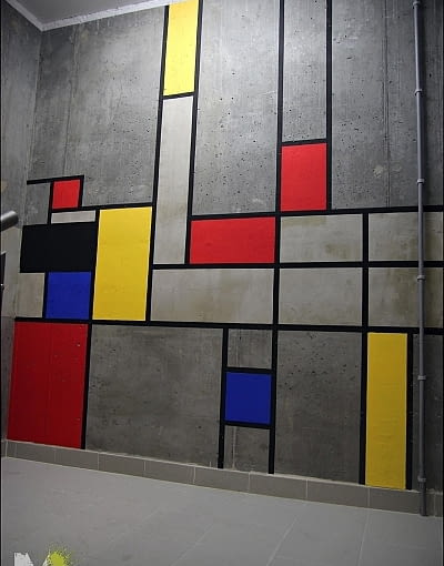 Klatka schodowa Woronicza Qbik; proj. Muralist mural, street art, mural we wnętrzach