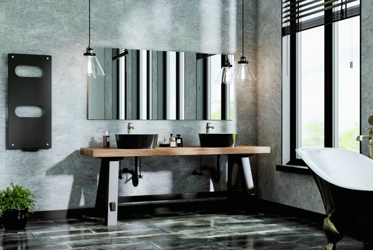 Grzejnik wyróżnia materiał. W przedniej gładkiej płycie ze szkła hartowanego wycięto zaokrąglone otwory. Całość wykończono stalą niskowęglową lakierowaną proszkowo. Kolory standardowe to biały, czarny, szary i czerwony. W tym modelu można zamontować grzałkę elektryczną