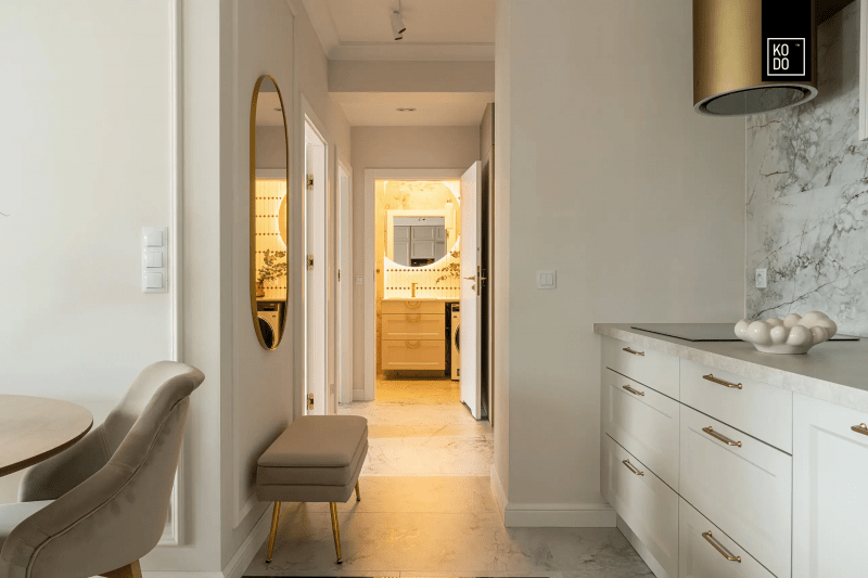 Wnętrza w złotej poświacie - projekt pracowni KODO