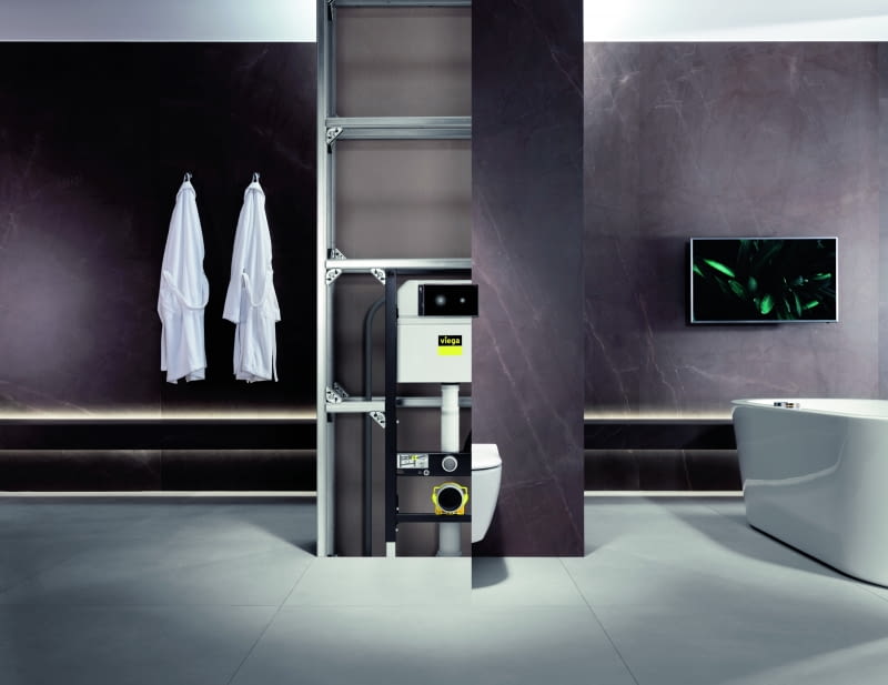 Coraz częściej ludzie marzą o przekształceniu łazienki w prawdziwy salon kąpielowy – zabudowanie stelaża w ściance dzielącej pomieszczenie otwiera wiele możliwości efektownej  aranżacji wnętrza, Viega Prevista