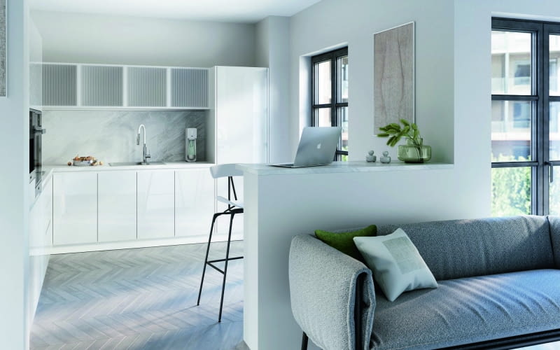 Kuchnia oddzielona od salonu niską ścianką.