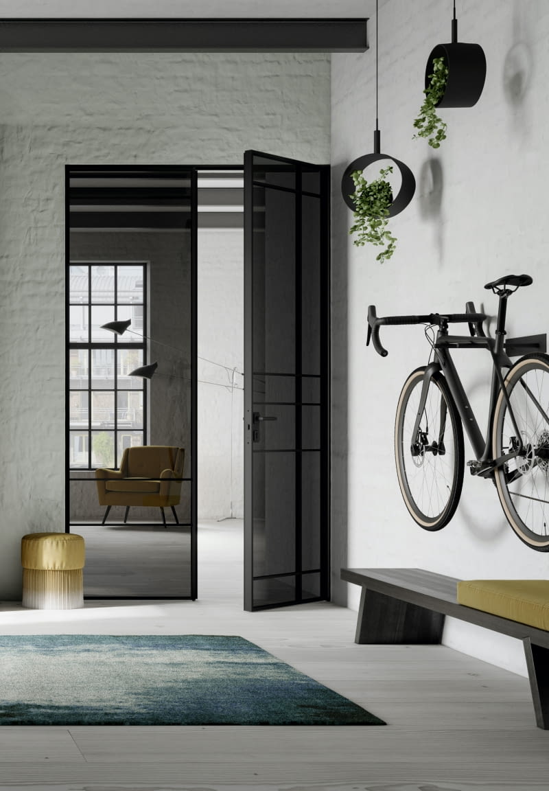 Eleganckie, szklane drzwi dwuskrzydłowe zachwycają niezwykle ascetycznym designem.