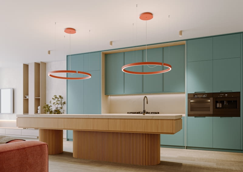 Modele wiszące to zawsze dobry wybór. W zależności od wielkości wyspy kuchennej można wybrać jedną podłużną lampę lub dwie pojedyncze lampy.