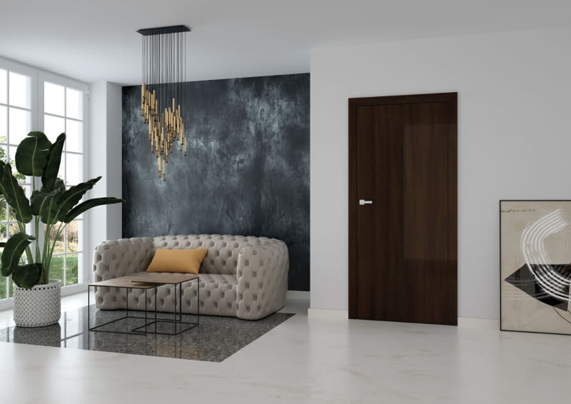 Proste drzwi jednoskrzydłowe to świetne rozwiązanie do minimalistycznych wnętrz, potrzebujących wyrazistego elementu przełamującego stonowany wystrój.