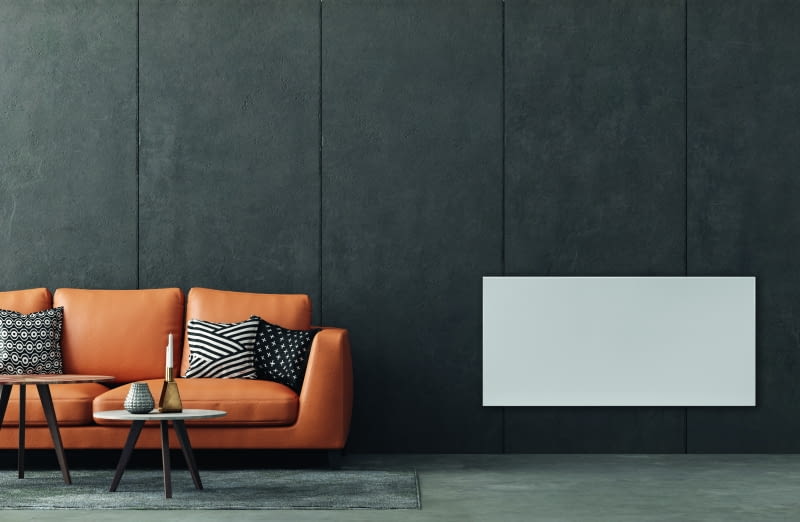 Grzejniki dostępne są w kilku wersjach wykończenia, np. z zupełnie płaskim, gładkim frontem lub z nadrukiem imitującym kamień. Na zdjęciu model grzejnika z serii HD-WAVE STEEL/HEAT DECOR