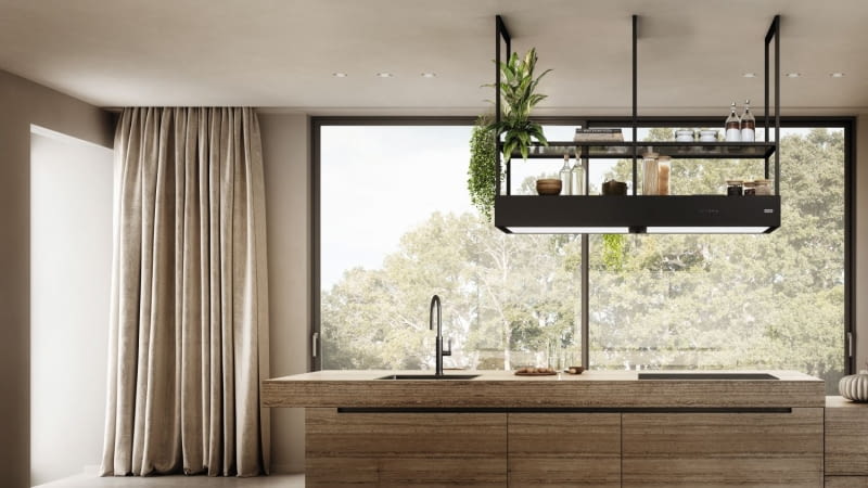 Okap może pełnić również funkcję uniwersalnej półki. Lekka konstrukcja bazująca na profilach w czarnym macie oraz półkach z przydymionego szkła wpisuje się w aktualne trendy wzornicze. Okap może pełnić również funkcję uniwersalnej półki. Lekka konstrukcja bazująca na profilach w czarnym macie oraz półkach z przydymionego szkła wpisuje się w aktualne trendy wzornicze.