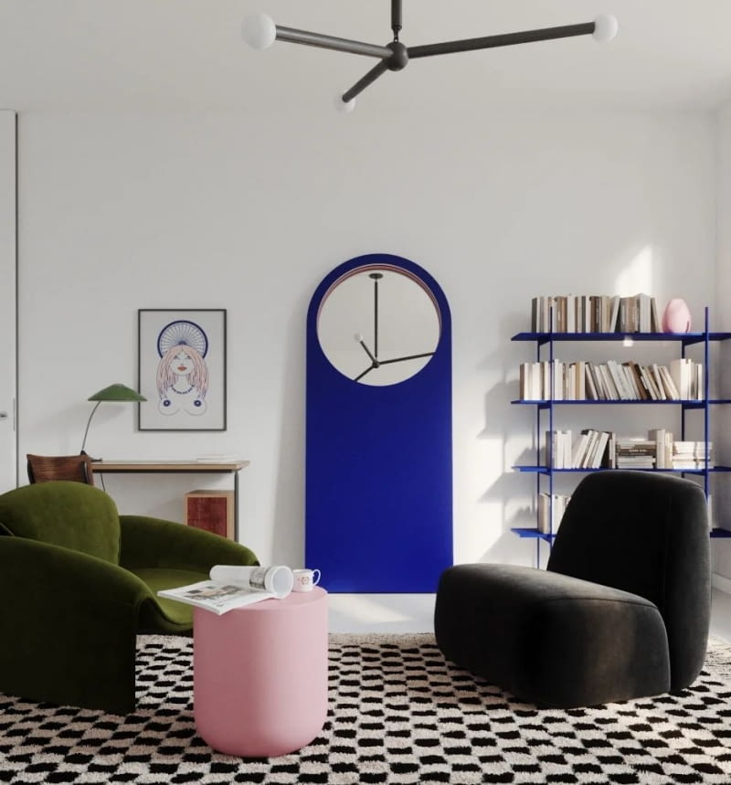 Głównym bohaterem tego salonu jest niewątpliwe lustro Cellist Cobalt Love. Towarzysząca mu po lewej stronie niewielka grafika nie konkuruje z jego urokiem – wisi niżej, jest nieduża, delikatna i dzięki niej lewa strona scenerii nie wydaje się pusta. Dopełnia też kompozycję, nawiązując do koloru oraz okrągłych motywów lustra. Wraz z konsolą poniżej i regałem po prawej stronie tworzy względem osi zwierciadła zrównoważony układ oparty na geometrii i symetrii.