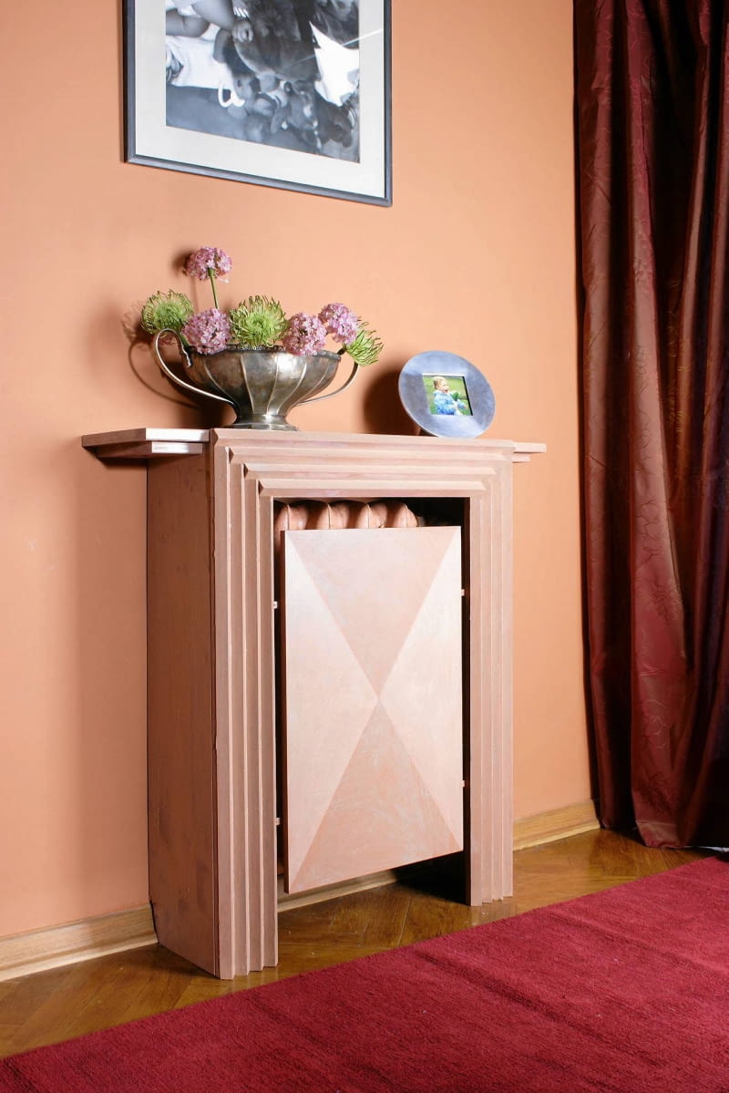 Grzejniki, zwłaszcza starego typu, nie zdobią wnętrza. Proponujemy je zasłonić estetyczną obudową, np. taką.