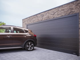 Bezpieczne, nowoczesne i trwałe bramy garażowe - co wybrać?
