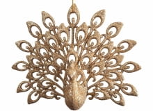 Odświętna porcelanowa zastawa, obrusy i serwetki trzymane na wyjątkowe okazje oraz dyskretne ozdoby ze szkła i błyszczącego metalu. Taka złoto-kryształowa kreacja tworzy we wnętrzu dostojny i uroczysty nastrój. Elegancja, ale bez ostentacji. <BR /> ŚWIĄTECZNE OZDOBY. Paw, akryl .15,40 zł Eurofirany