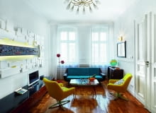 W salonie architekci Monomoka zaprojektowali graficzną ramę dla ceramicznej mozaiki, z wycinanych i malowanych ręcznie płyt MDF.