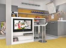 Wystarczy porzucić rutynę, a wtedy okaże się, że nawet tradycyjny bufet może nas zaskoczyć nową funkcją. <BR > Bufet zamykający ciąg szafek nie tylko przesłania kuchenny rozgardiasz, ale pozwala też zyskać dodatkowy blat roboczy, mały stolik śniadaniowy albo szafkę. Taki mebel można jednak wykorzystać również od strony pokoju dziennego. Proponujemy urządzić w nim kącik na sprzęt radiowo-telewizyjny z płaskim telewizorem, odtwarzaczem DVD i półeczką na podręczny zbiór płyt. W wizualizacji bufet z telewizorem został uzupełniony niewielkim stolikiem-barkiem. Takie rozwiązanie gwarantuje, że nikt nie będzie oglądał telewizji przy posiłku.