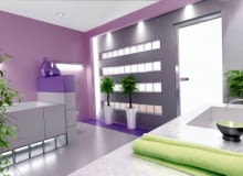 W czterech rzędach. Symetrycznie rozmieszczone rzędy pustaków, podświetlone z góry i z boku halogenami ukrytymi za osłoną z płyt gipsowo-kartonowych, zdecydowanie urozmaiciły gładką płaszczyznę ściany. Do nich doskonale pasują drzwi wykonane z białego matowego szkła. Przepuszczają one światło z sąsiedniego pomieszczenia i efektownie rozjaśniają wnętrze.