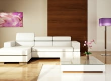 SALON. Rozkładana kanapa narożna przydaje się jako rezerwowe miejsce do spania. Często jednak, zwłaszcza w niedużych mieszkaniach, po prostu zastępuje łóżko. W takim przypadku trzeba zwrócić baczną uwagę na te cechy, które wpływają na wygodę nocnego wypoczynku. <BR >Infinity, obity tkaniną lub skórą, modułowy, 275 x 175 cm, powierzchnia spania 140 x 220 cm, pojemnik na pościel, od 5999 zł, producent: Caya Design