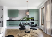 W kuchni zdecydowano się na kolorową zabudowę meblową, ale stonowany odcień nie dominuje nad całym pomieszczeniem. Mieszkanie w Jelitkowie