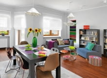 Solidny stół z drewna dębu bejcowanego na ciemny brąz stracił nieco ze swej powagi za sprawą krzeseł. Nie pochodzą z jednego kompletu - cztery z nich są zrobione ze sklejki (modele Maple zaprojektowane przez Gernota Oberfella i Jana Wertela dla firmy Iker), dwa pozostałe z technorattanu. Ten sztuczny materiał do złudzenia przypomina wiklinę, tak charakterystyczną dla stylu ludowego. jadalnia, stół do jadalni