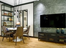 Inwestorzy marzyli o przytulnym wnętrzu, z odrobiną loftowego charakteru. Pokój dzienny z jadalnią został zaprojektowany jako spójna stylistycznie całość. Salon z jadalnią w industrialnym stylu