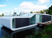 Pływająca willa De Omval architektów +31 architects w Amsterdamie Pływająca willa, domy na wodzie, dom na widzie w Amsterdamie