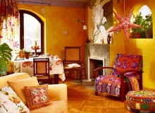 Radość płomiennych kolorów. Zastosowanie w salonie tak intensywnych barw wymaga wprawdzie pewnej odwagi, ale efekt wart jest ryzyka. Pod warunkiem oczywiście, że dobrze się czujemy w otoczeniu mocnych kolorów. A te są tutaj wszędzie - począwszy od ścian i podłogi, a skończywszy na tkaninach ozdobionych wyrazistymi kwiatowymi motywami. Taka feeria barw podniesie temperaturę w pomieszczeniu co najmniej o kilka stopni... Radość płomiennych kolorów. Zastosowanie w salonie tak intensywnych barw wymaga wprawdzie pewnej odwagi, ale efekt wart jest ryzyka. Pod warunkiem oczywiście, że dobrze się czujemy w otoczeniu mocnych kolorów. A te są tutaj wszędzie - począwszy od ścian i podłogi, a skończywszy na tkaninach ozdobionych wyrazistymi kwiatowymi motywami. Taka feeria barw podniesie temperaturę w pomieszczeniu co najmniej o kilka stopni...