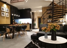 Mieszkanie po remoncie zyskało loftowy charakter z użyciem betonu, czerni i drewna. Mieszkanie po remoncie zyskało loftowy charakter z użyciem betonu, czerni i drewna.