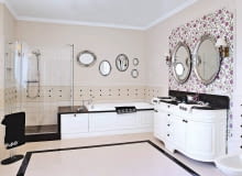 <B>Obudowę wanny w łazience można wykonać na wiele sposobów. Można też zakupić wannę z gotową obudową. Prezentujemy kilka rozwiązań do waszych łazienek. </B> <BR /> Wanna z obudową i schowkiem. Obudowę wanny w tej łazience wykonano na zamówienie. Front jest z malowanego dębu, natomiast bok i blat, w którym zamontowano baterię - z granitu. Pod nim przewidziano pojemny schowek. Część blatu służy jako siedzisko w sąsiadującej z wanną przestronnej kabinie prysznicowej. łazienka, obudowa wanny, wanna