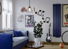 Grzejnik składający się z rzędu dużych pionowych paneli o okrągłym przekroju, mających konstrukcję „rurka w rurce”, nie tylko zapewnia wysoką wydajność grzewczą, ale i ładnie wygląda, Grzejnik składający się z rzędu dużych pionowych paneli o okrągłym przekroju, mających konstrukcję „rurka w rurce”, nie tylko zapewnia wysoką wydajność grzewczą, ale i ładnie wygląda,