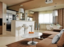 Beż wprowadza do wnętrz atmosferę spokoju i wyciszenia, która nie nudzi się szybko. Od lat nie wychodzi z mody, bo znakomicie sprawdza się we wszystkich stylach, zarówno nowoczesnych, podkreślając ich prostotę, jak i stylizowanych na dawne, w których nie konkuruje z ozdobnymi formami mebli i detali. Ma też inną istotną zaletę - bardzo łatwo łączy się z innymi kolorami. Czy to będzie zieleń i brąz, szarości, czy też fiolety albo czerwienie, zestawienie kolorystyczne z pewnością będzie miłe dla oka i dobrze przez nas tolerowane. Co więcej, to jedna z nielicznych barw, która dobrze prezentuje się w aranżacjach monochromatycznych skomponowanych z wielu swych odcieni - od jasnych aż po wpadające w brąz. <BR />Od kremowej bieli, poprzez średnie i ciemne odcienie beżu po brąz - zestawienie kolorystyczne skomponowane na zasadzie harmonii barw buduje odprężający nastrój tego wnętrza, idealnie nadający się do odpoczynku po ciężkim dniu. UWAGA ! PONOWNA PUBLIKACJA WYLACZNIE ZA ZGODA WLASCICIELI WARSZAWA , MIESZKANIE W BLOKU , WNETRZA , POKOJ DZIENNE , MEBLE , STYLIZACJA AGNIESZKA OSAK-REJMER FOT. SYLWESTER REJMER PUBLIKACJA CZTERY KATY NR 12 (230) - 12 2010 SLOWA KLUCZOWE: WNETRZE MEBEL POKOJ ZDJĘCIE DO WKŁADKI: PUBLIKACJA CZTERY KATY NR 12 (230) - CZASOPISMA