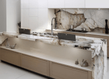 Zabudowa kuchenna wykorzystująca kwarcyt Patagonia z oferty firmy Interstone.
