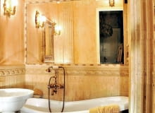 Prezentowana łazienka to stylowy prawdziwy salonik kąpielowy retro. Ścianę chroni boazeria z trawertynu; na podłodze płytki marmuru. Lustro zdobi zwieńczenie starego pieca. UWAGA ! DO JEDNORAZOWEJ PUBLIKACJI GOSC CZTERECH KATOW - EWA KUKLINSKA ( AKTORKA , TANCERKA I PIOSENKARKA ) , NZ MIESZKANIE , WNETRZA , LAZIENKA STYLIZACJA AGNIESZKA OSAK - REJMER FOT. MAREK SZYMANSKI PUBLIKACJA CZTERY KATY NR 7 (237) - 7 2011 SLOWA KLUCZOWE: WNETRZE LAZIENKA ZDJĘCIE DO WKŁADKI: PUBLIKACJA CZTERY KATY NR 7 (237) - CZASOPISMA