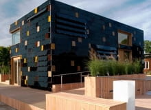 Zwycięski projekt domu zasilanego energią słoneczną stworzony przez studentów Uniwersytetu Technicznego w Darmstadcie niemcy, kostka, konkurs, budownictwo zrównoważone, ekologia, waszyngton, elewacja, dom jednorodzinny